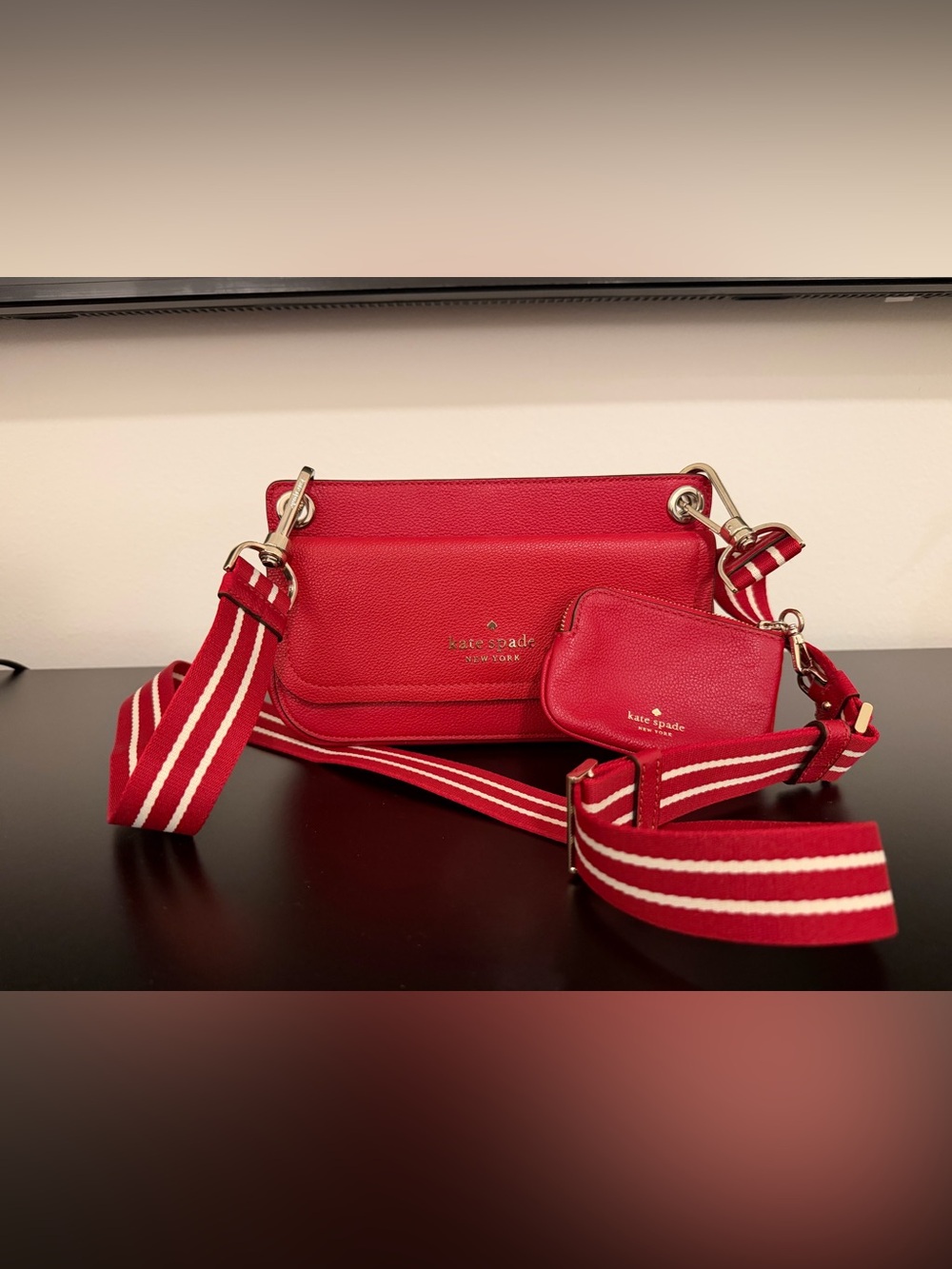 kate spade red pebbled leather crossbody with striped strap and pouch